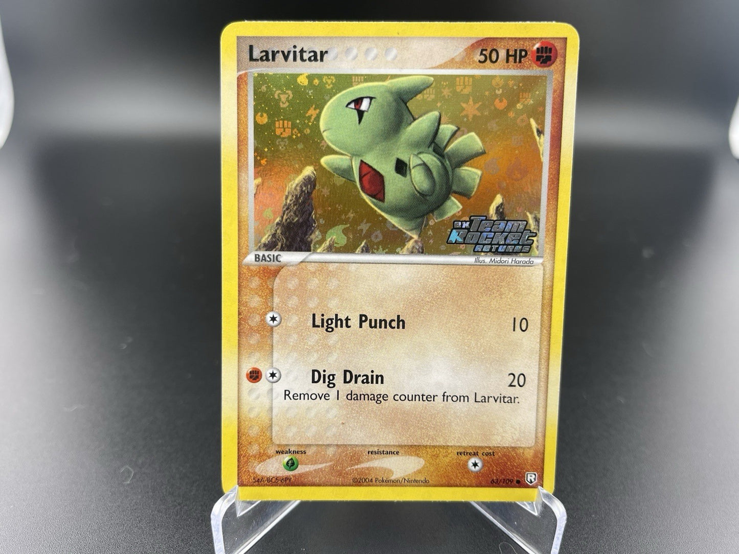 Larvitar 63/109 EX Team Rocket Returns Reverse Holo Stamped LP